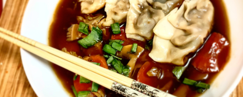 Chinese spicy and sour mushroom soup with dumpling