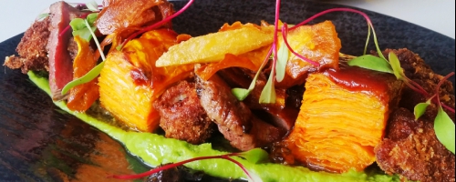 Lamb loin with kumara gratin, pea puree, burnt sage butter