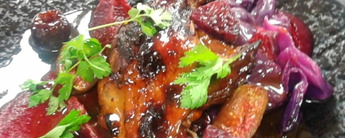 Braised duck leg with a blood orange and cherry sauce, beetr
