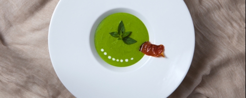 Pea soup with basil and crisp of parma ham