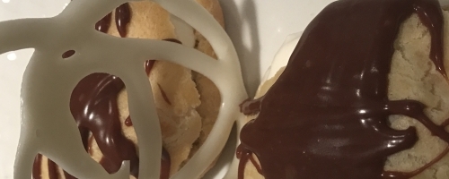 Cream Puffs with chocolate ganache and white chocolate twirl
