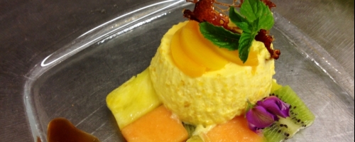 Peach bavarese with fruit chessboard