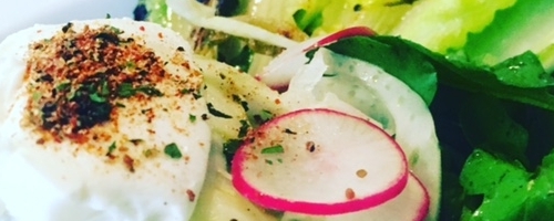 Poached eggs with French green lentils and grilled romaine