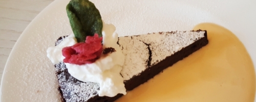 Soft chocolate cake with passito wine zabaglione