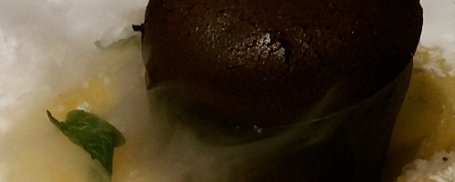 Warm chocolate cake and spiced pineapple carpaccio