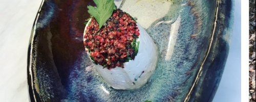 vegan cheese with pink peppercorns and basil pesto