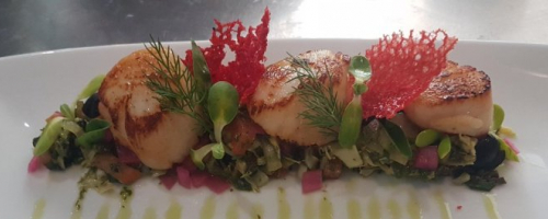 Scallops with olives and artichoke