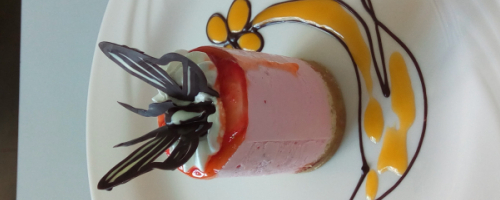 Strawberry mousse with a mango sauce