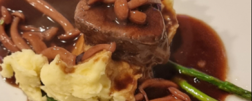 Pan seared Fillet of Pork with forest mushrooms red wine jus