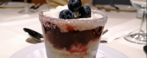 Rice pudding with red berries jam