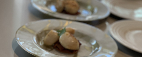 Seared scallops over Caramel Bacon