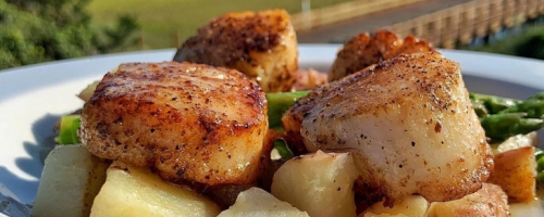 Seared Scallops over Potatoes