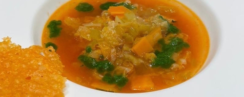 Vegetable soup with parmesan crust