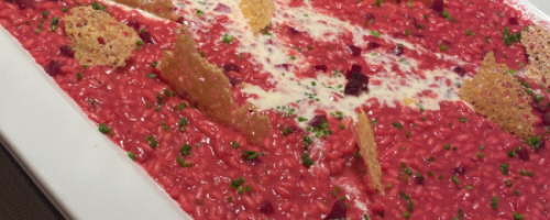 Beetroot risotto with goat cheese cream and Parmesan cheese