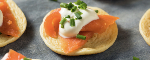 Smoked salmon on homemade blinis
