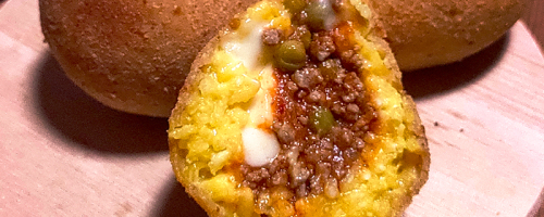Mini Saffron Arancino with Veal Ragù & Peas